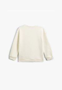 Jasna kremowa bluza z okrągłym dekoltem, długimi rękawami i ściągaczami. Miękka tekstura, minimalistyczny design i brak widocznych wzorów.