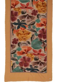 Floral scarf featuring vibrant yellow, red, blue, and green flowers on a beige background, bordered by a mustard fringe and subtle trim.