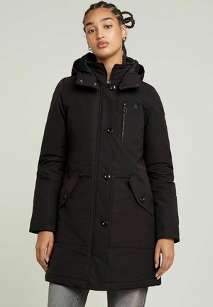 Black insulated parka with a detachable hood, front zipper, snap buttons, and multiple pockets. Features a smooth texture and practical design.