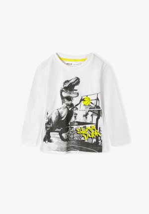 Fehér hosszúujjú póló, fekete dinoszauruszos grafikával, élénk sárga kosárlabdával és "SLAM DUNK" felirattal neon sárga színben.