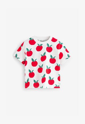 Lyhythihainen T-paita valkoisesta puuvillasta, jossa on punaisen omenan ja vihreiden lehtien kuvio. Laatikkomainen malli ja pyöreä pääntie.