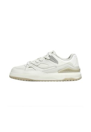 White low-top sneaker with beige sole, lace-up front, and padded collar displayed on a plain white background.