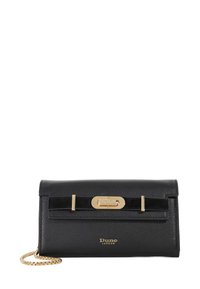 Black leather wallet with a textured finish, gold hardware, and a removable chain strap, featuring a decorative black bow accent.