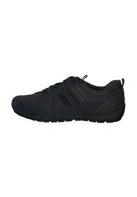 Black athletic shoe featuring synthetic upper, mesh accents, lace closure, and textured rubber sole. Minimalist design with subtle stitching details.