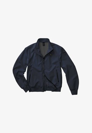 Marineblauwe bomberjack met een ritssluiting aan de voorkant, twee met rits afgesloten zijzakken, geribbelde manchetten en zoom, en een klein logo op de linkermouw.