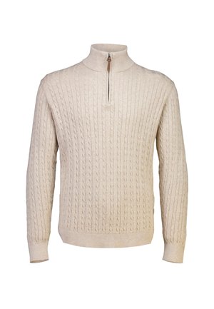 Cream-colored, cable knit sweater with a high collar and a quarter zip, featuring ribbed cuffs and hem for texture.