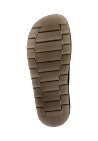 Suela de un zapato de goma beige con ranuras horizontales, cuenta con una etiqueta de tamaño "41" y un tacón ligeramente redondeado para mayor comodidad.