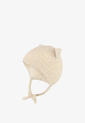 Soft cream-colored fleece baby hat with ear flaps, tied chin straps, and small decorative ears on top.