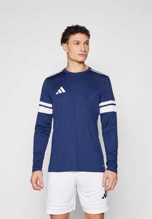 Long-sleeve navy athletic shirt with white stripes on sleeves, made from moisture-wicking fabric; features Adidas logo on chest.