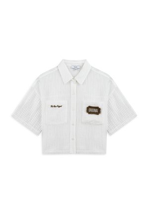 Gekürzte weiße Bluse mit vertikaler Rippstruktur, kurzen Ärmeln, Knopfverschluss, zwei vorderen Taschen und gestickten Patches in Braun.