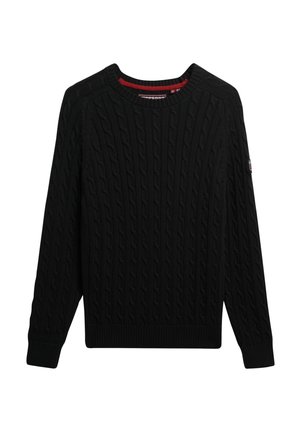 Pull en tricot noir à mailles torsadées avec un col rond. Présente des bords-côtes aux poignets et à l'ourlet, fabriqué en tissu tricoté texturé. Accentué d'une étiquette logo.
