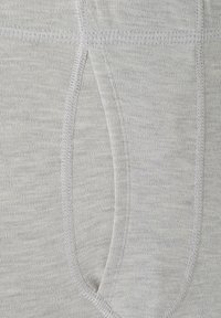 Light gray cotton fabric with a smooth texture. Features a side pocket and flat seams for added comfort. Simple, functional design.