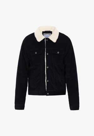 Czarna kurtka z korduroy z kremowym kołnierzem z wełny, zapięcie na guziki z przodu i dwie kieszenie na piersi. Charakteryzuje się teksturowanym materiałem i strukturalnym wzornictwem.