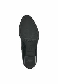 Semelle de chaussure noire avec une surface en caoutchouc texturé, présentant une légère courbure, des bords lisses et des détails de logo près du talon. Taille 37.