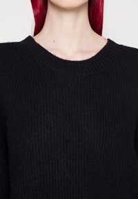 Won Hundred Neule - black
