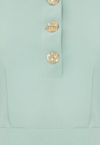 Blusa verde menta chiaro con tessuto texturizzato, dotata di una chiusura con bottoni a quattro bottoni in tonalità oro. Collo piatto e vestibilità sagomata.