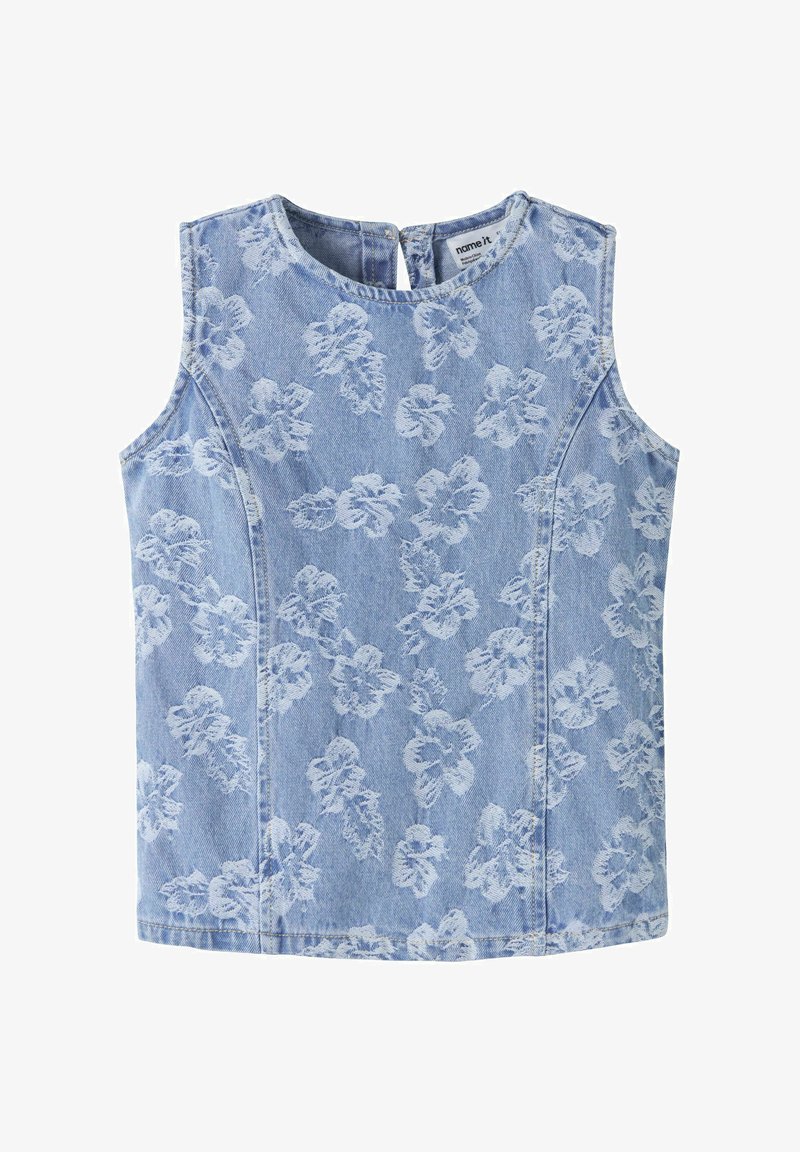 Haut en denim bleu clair sans manches avec motif floral blanc et encolure ronde, doté d'une fermeture à boutons au dos.
