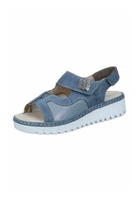 Blue sandal made of soft suede and mesh, featuring open toe and heel, adjustable strap, and a chunky white sole with a textured design.