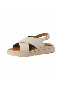 Light beige sandal with cross straps, open toe, and a back strap. Features a cushioned insole and a white textured sole for grip.