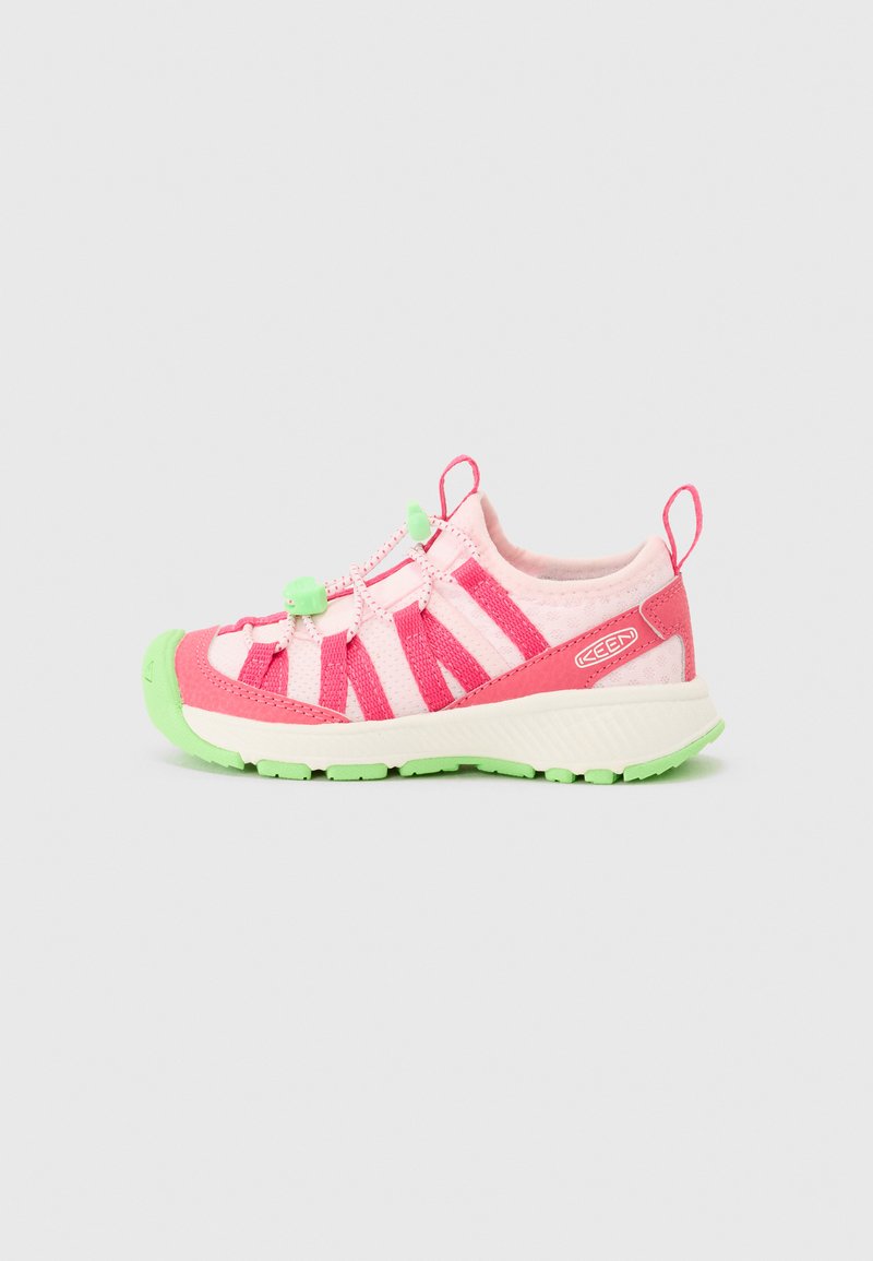 Children's sports shoes in pink and green, featuring a breathable mesh upper, elastic laces, rubber toe cap, and a textured sole.