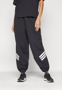 adidas Sportswear FUTURE ICONS THREE STRIPES PARACHUTE - Treningo apatinė dalis - black