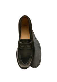 Black leather loafers with a smooth finish, detailed stitching, and a subtle apron design. Textured gray rubber sole for grip.