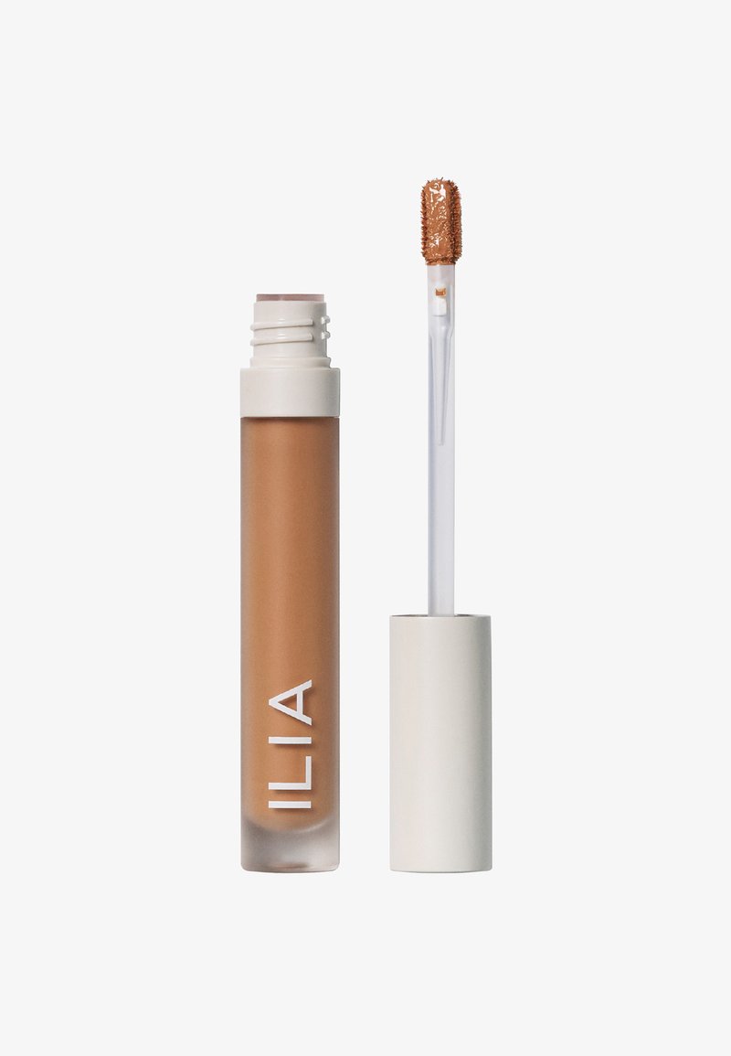 ILIA lipproduct in een transparante amberkleurige tube met een witte dop. Heeft een zachte, fuzzy applicator voor een nauwkeurige applicatie.