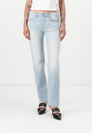 Light blue denim flared jeans with a regular fit, featuring a classic five-pocket design and a subtle faded texture.