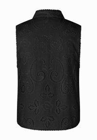 Top negru fără mâneci, cu un model brodat floral texturat, guler ascuțit și margini zimțate; un finisaj de țesătură netedă.