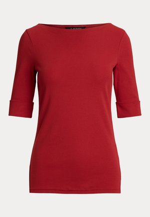 Red T-shirt made of soft cotton, featuring a boat neckline and three-quarter sleeves with rolled cuffs. Smooth texture and fitted shape.