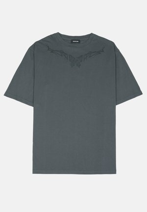 Gray cotton t-shirt with short sleeves, crew neck, and dark butterfly graphic print on the chest. Smooth texture with a relaxed fit.
