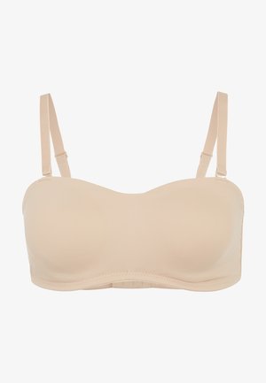 Soutien-gorge بدون bretelles en nude avec un tissu lisse, des bonnets moulés, des bretelles réglables et une fermeture à crochets pour un bon maintien et un ajustement parfait.