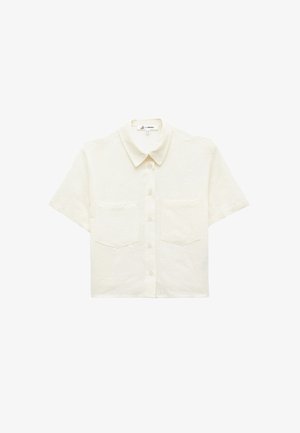 Short-sleeve, button-up shirt in cream. Featuring a subtle floral texture, two front pockets, and a classic collar design.