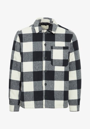 Geruite shirt in zwart en wit, gemaakt van zachte stof. Voorzien van knoopsluiting, kraag en een enkele borstzak met een flap.