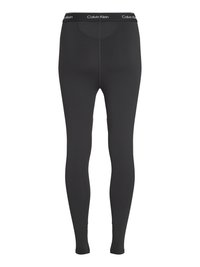 Zwarte leggings van rekbaar materiaal met een aansluitend ontwerp. Voorzien van een waistband met logo en een gladde textuur. Geen zichtbare patronen.