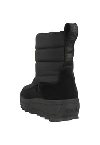 Bota aislada negra con parte superior acolchada, suela de goma texturizada y una etiqueta de agarre con la marca "PAJAR". Material suave y duradero.