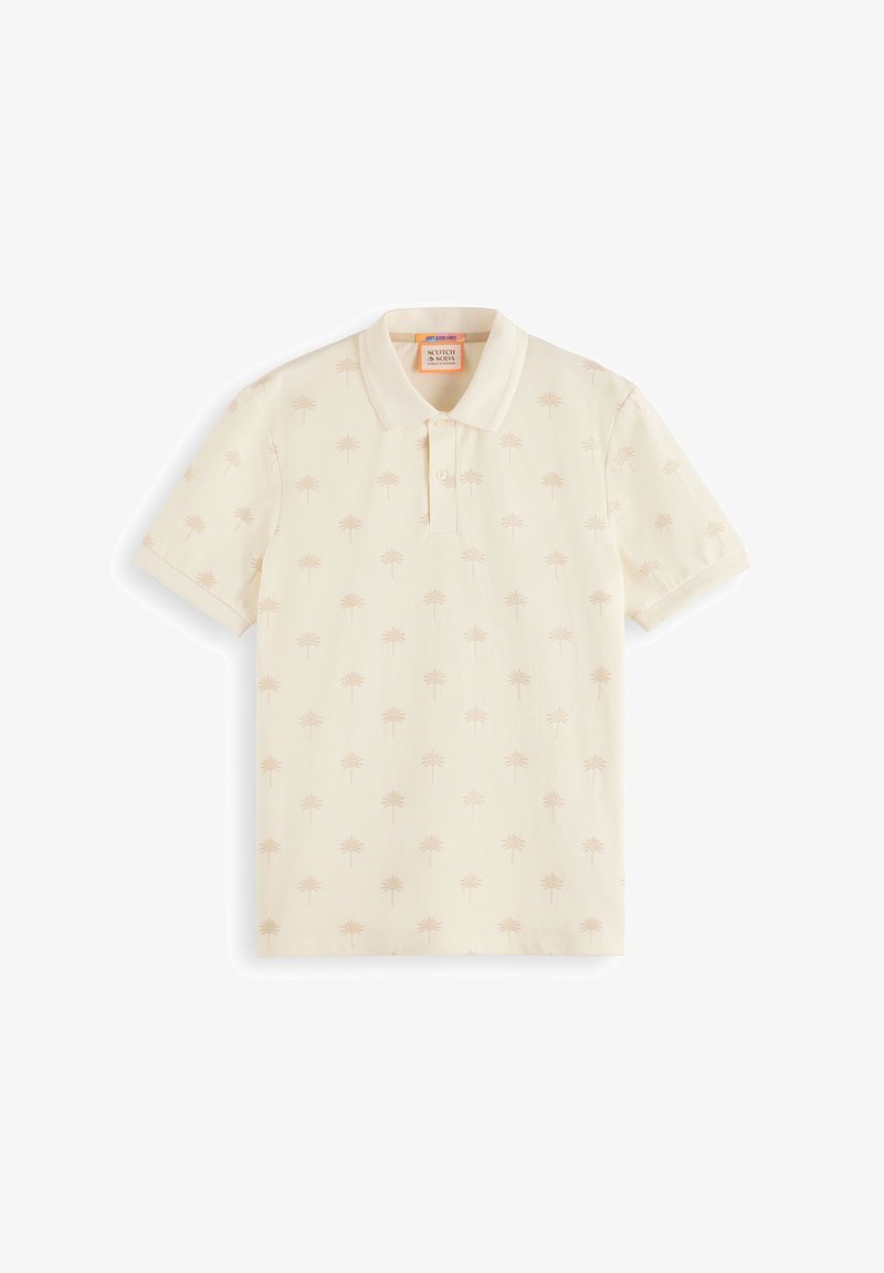 Polo in crema chiaro con un sottile motivo di palme. Presenta un colletto e maniche corte. Realizzato in tessuto liscio.