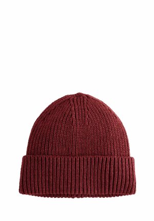 Red knit beanie with ribbed texture and a folded cuff. Features a rounded top and vertical lines, made from soft, warm material.