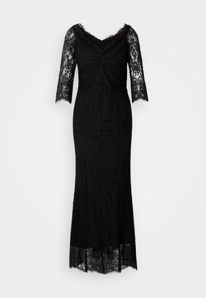 Schwarzes Spitzen-Abendkleid mit drei Viertelärmeln, einem tiefen V-Ausschnitt, tailliertem Oberteil und einem weit austellenden Rock mit gewelltem Saum.