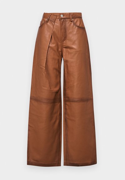 Brown leather wide-leg trousers with front pleats, five pockets, and a zipper closure. Smooth texture with minimal hardware details.