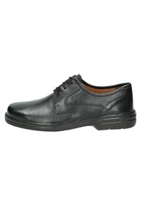 Zapato de vestir de cuero negro con textura suave, puntera redonda y diseño de cordones. Presenta una plantilla acolchada y suela de goma.
