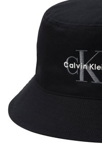 Black bucket hat with gray embroidered Calvin Klein "CK" logo on front center.