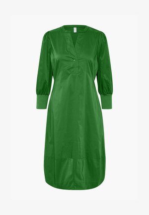 Grøn bomuldsdress med V-hals, tre-knaps placket og ballonærmer. Har sammensnørede manchetter og en løs A-linje silhuet ved kanten.