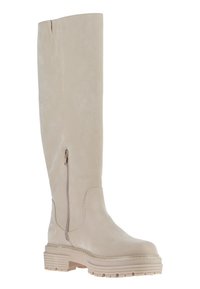 Beige kniehøye støvler laget av semsket skinn, med glidelås på siden, teksturert skaft, og en kraftig, rillet såle for bedre grep.