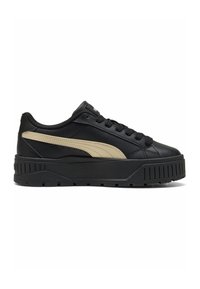 Sneakers in pelle nera con suola spessa, caratterizzati da un design con accenti beige sui lati e lacci neri. Finitura testurizzata.