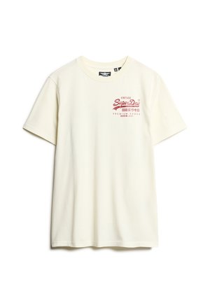 Cremfarbener Baumwoll-T-Shirt mit kurzen Ärmeln. Mit einem roten Grafikdruck mit dem Text "Vintage Super-Dry" auf der Vorderseite. Klassischer Rundhalsausschnitt.