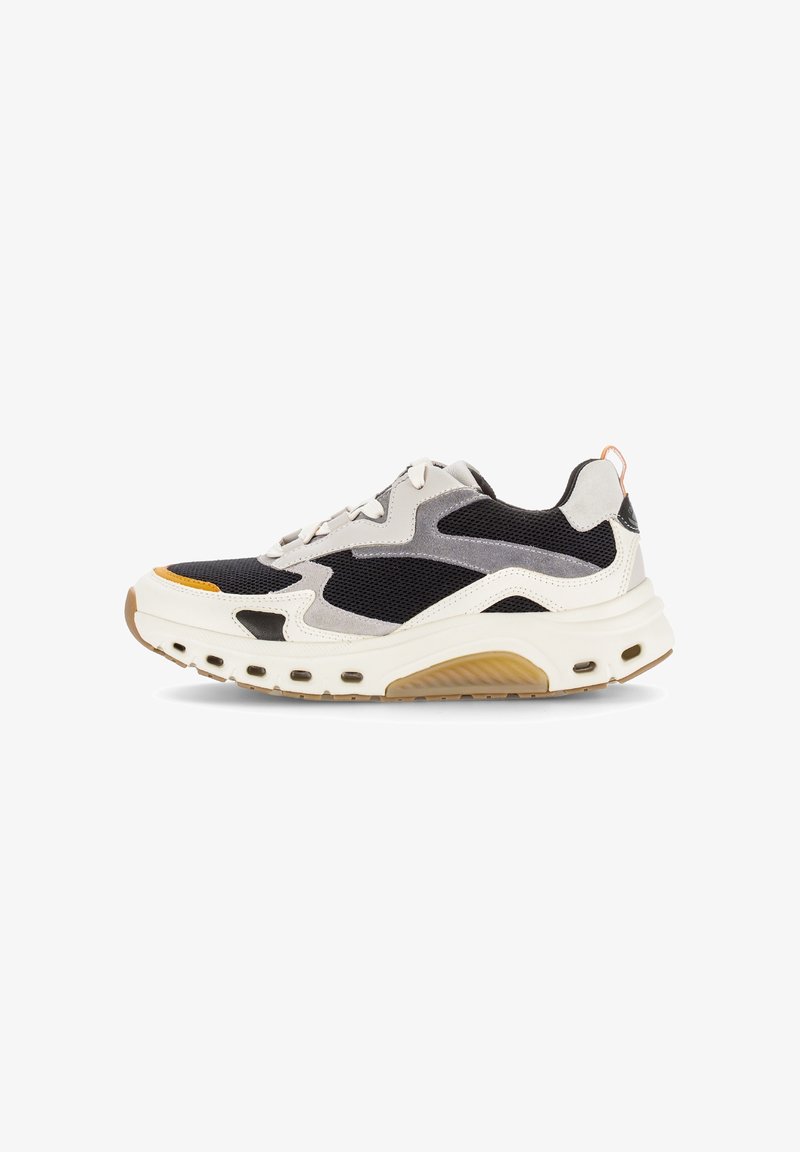 Black and gray sneaker with a mesh upper, suede accents, and a white midsole. Features a thick sole and orange detailing.