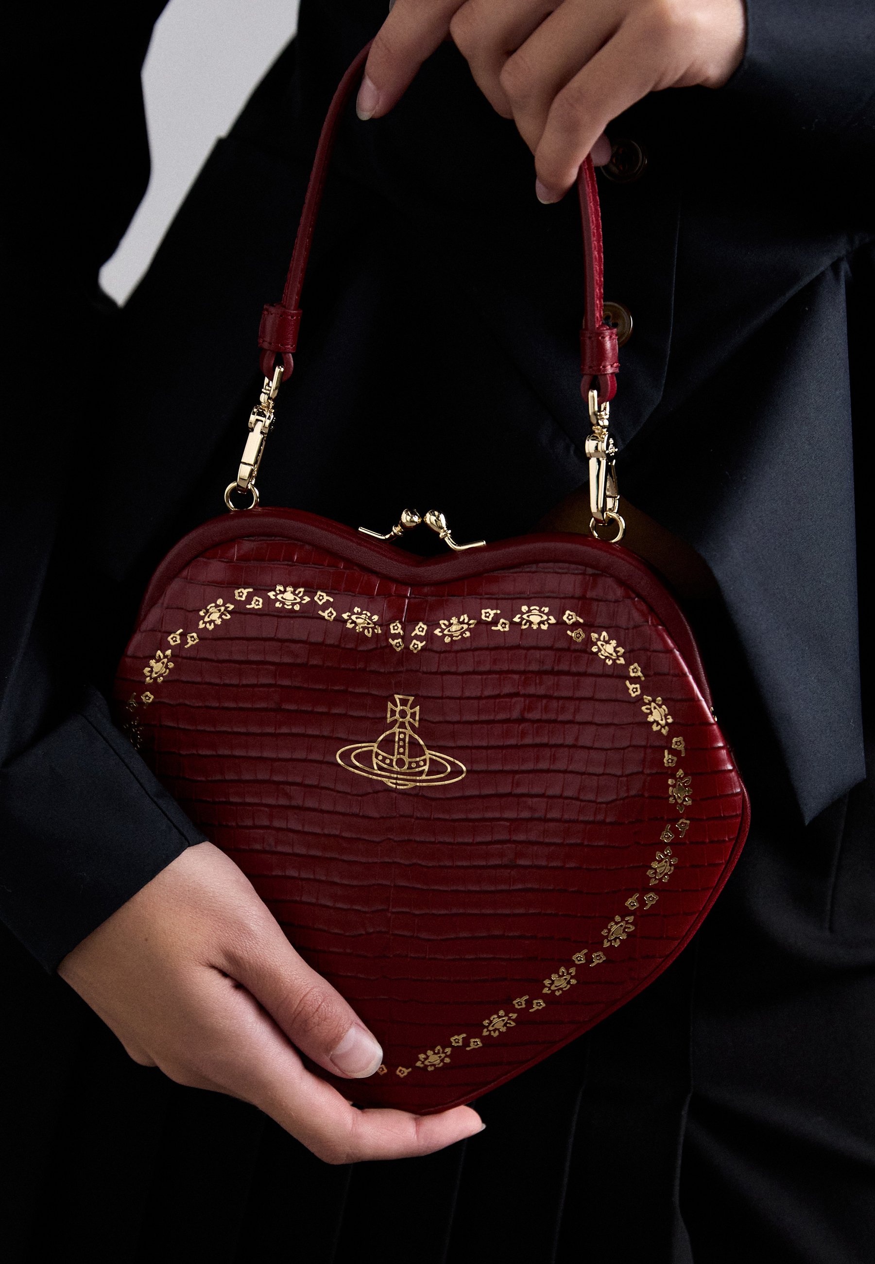 johanna heart mini backpack black Jon Hart Design metal Orb bas relief accents the front Vivienne Westwood Black Johanna Heart