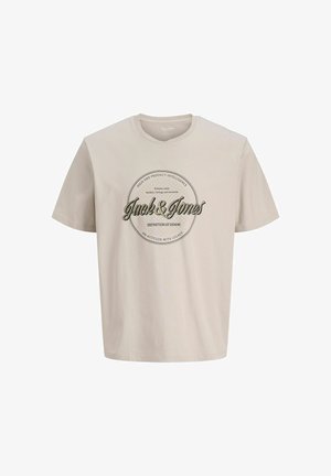 Beige cotton t-shirt with a round neck. Features a circular logo in dark green and black text on the front, stating “Jack & Jones.”