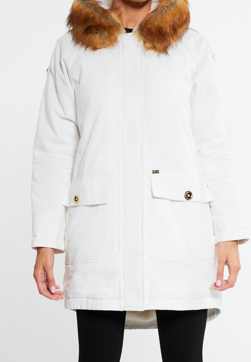 White parka jacket with a faux fur collar in orange-brown, front pockets with button closures, and a straight cut without a hood.